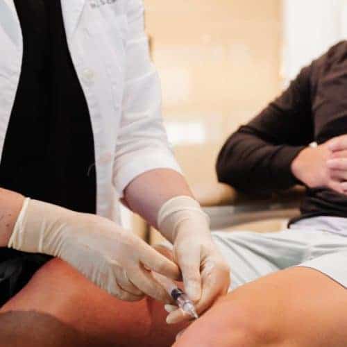 Aesthetician Giving Joint Therapy Injection to Patient | Ruma Aesthetics in Santaquin UT